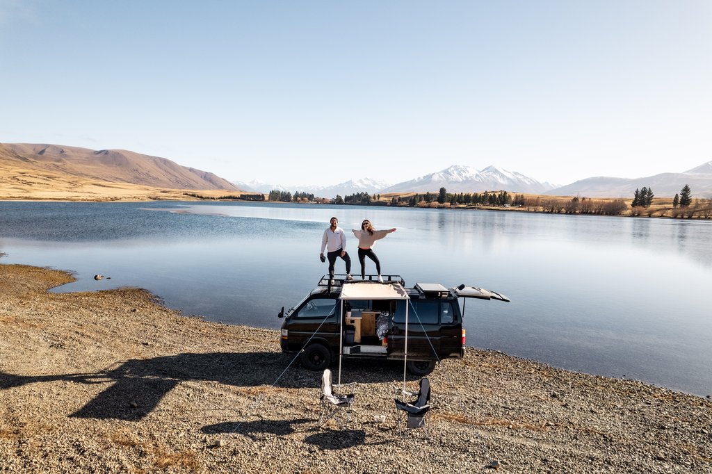 Snow-capped mountains and campervan on a Canterbury road trip, South Island.