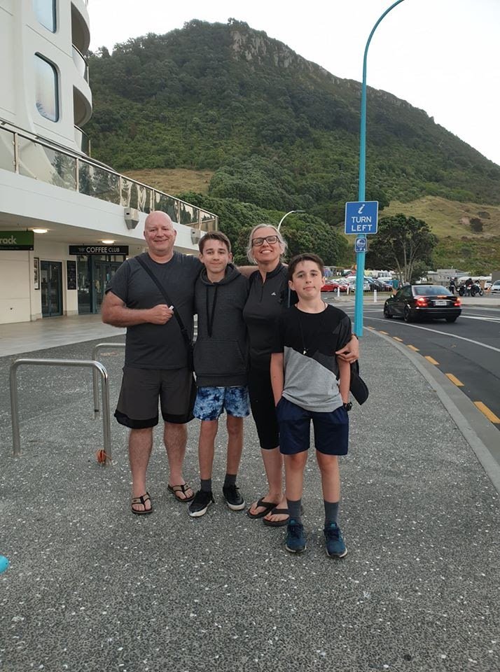 Campervan parked up at a scenic campsite, stunning West Auckland views.