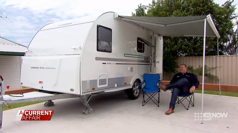 Caravan holiday: Campervan parked by the beach, perfect for a budget-friendly Aussie getaway.