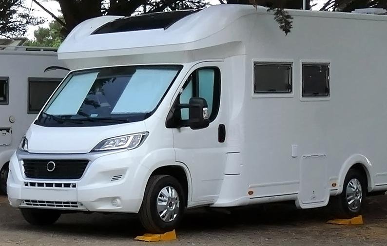 Campervan parked up in scenic countryside; opportunity to earn income hiring out your RV.
