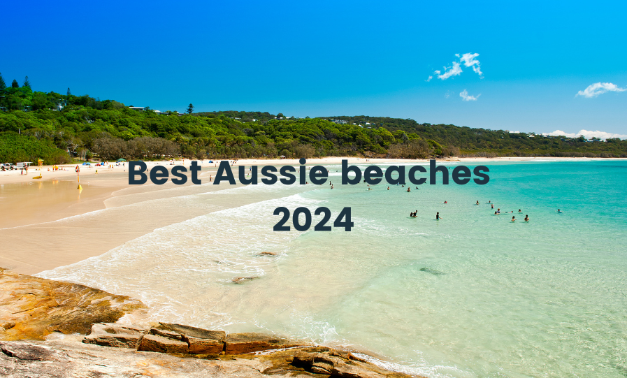Campervan parked on a clifftop overlooking a stunning Aussie beach. Time for a road trip!