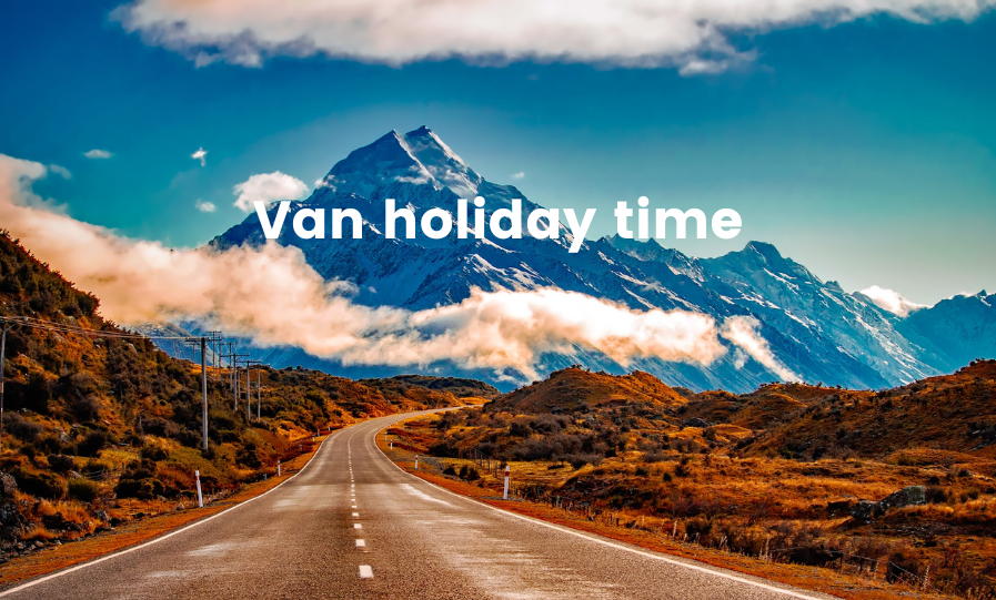 Campervan parked up beside a scenic South Island lake, perfect for a rejuvenating holiday.