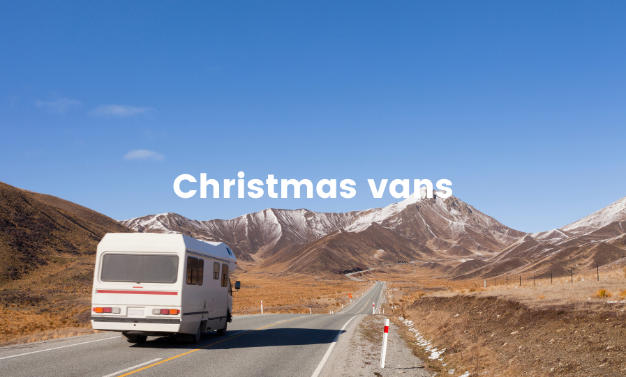 Campervan parked up at a scenic NZ campsite, ready for Christmas adventures.