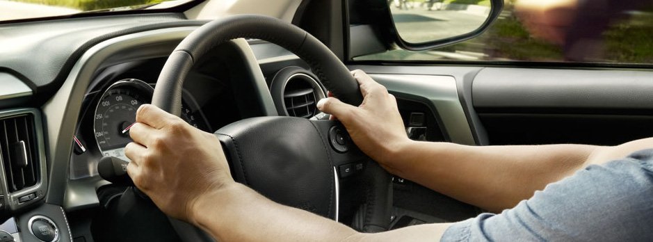 Family road trip: car packed, kids excited, heading off on a camping adventure.
