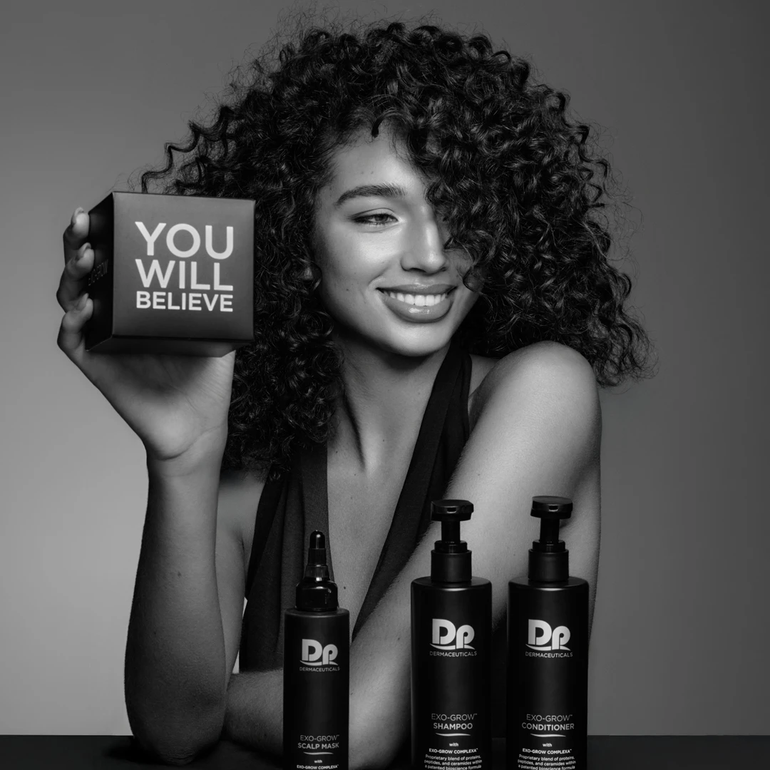 Image of model holding EXO-GROW products