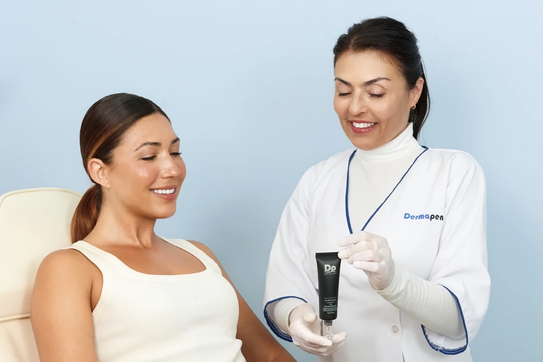 Image of clinician presenting client with hair care protocols