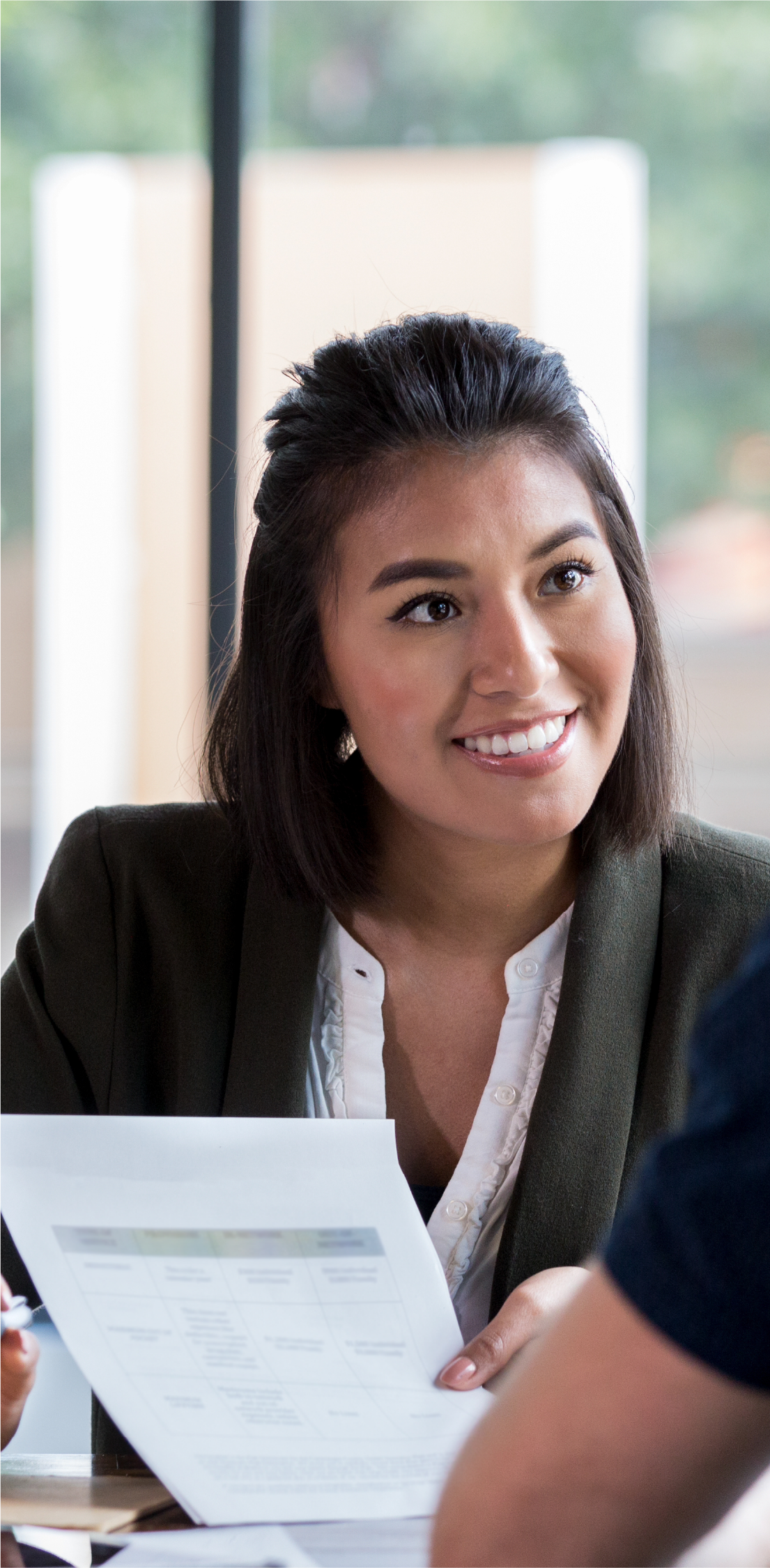 Adviser displaying paperwork