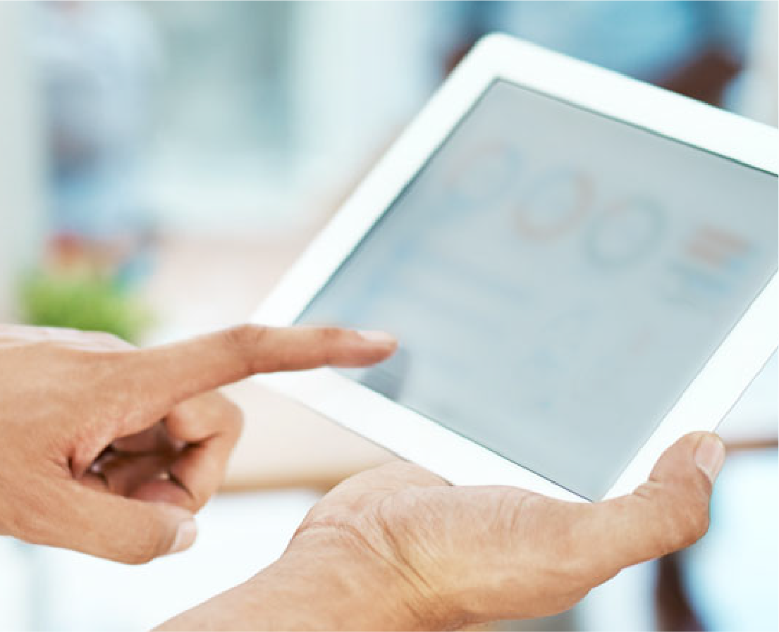 Person pointing at ipad