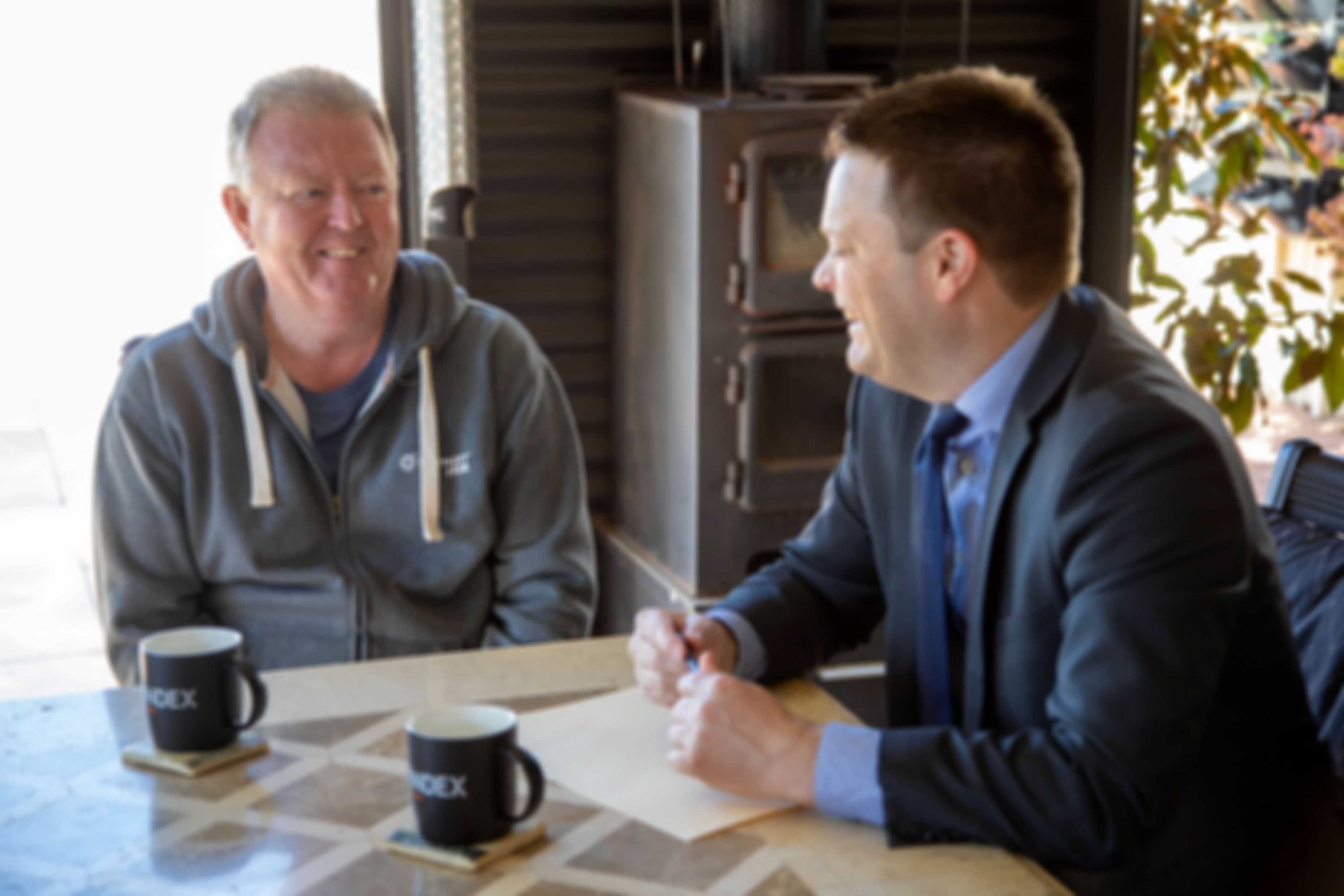 Wayne Humphries talking to Premier adviser