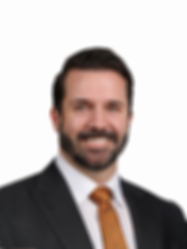 Corporate headshot of Simon McGuirk Findex advisor