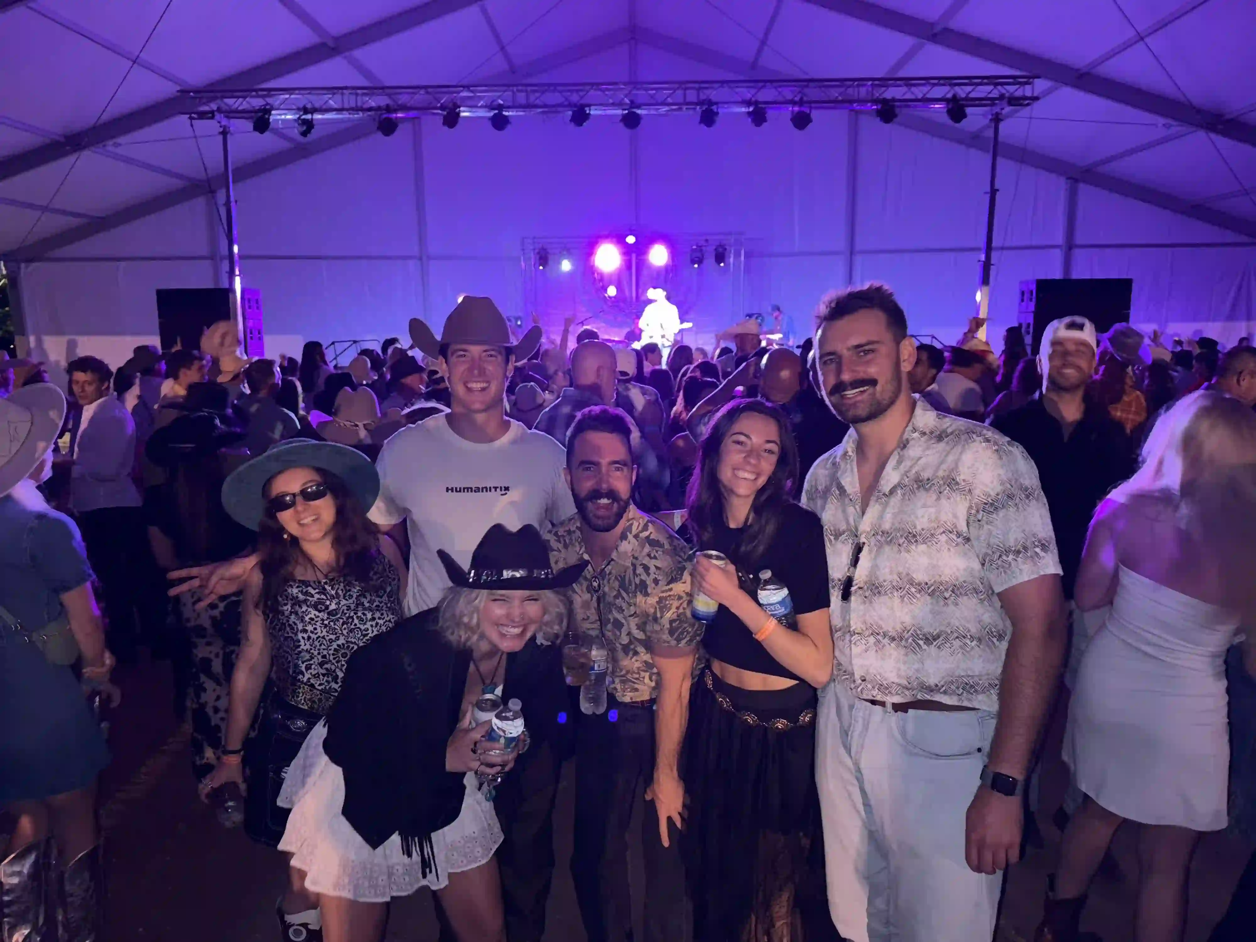 Humanitix team at the Denver Barn party in cowboy hats