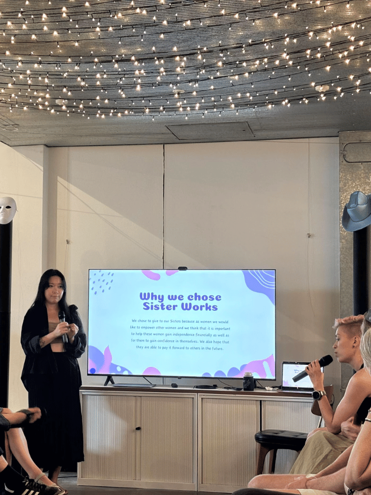 Addie and Ana presenting about Sisterworks