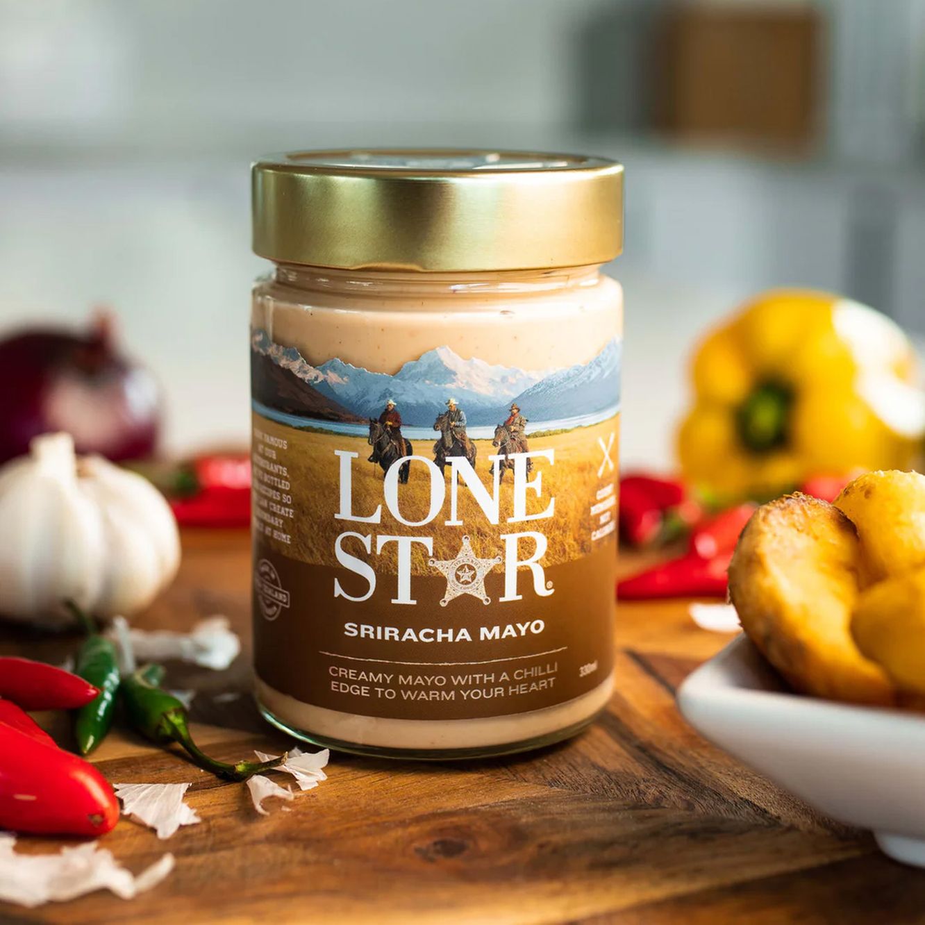 A jar of Lone Star Sriracha Mayonnaise – a creamy, spicy sauce perfect for chicken drumsticks, burgers, and dipping.