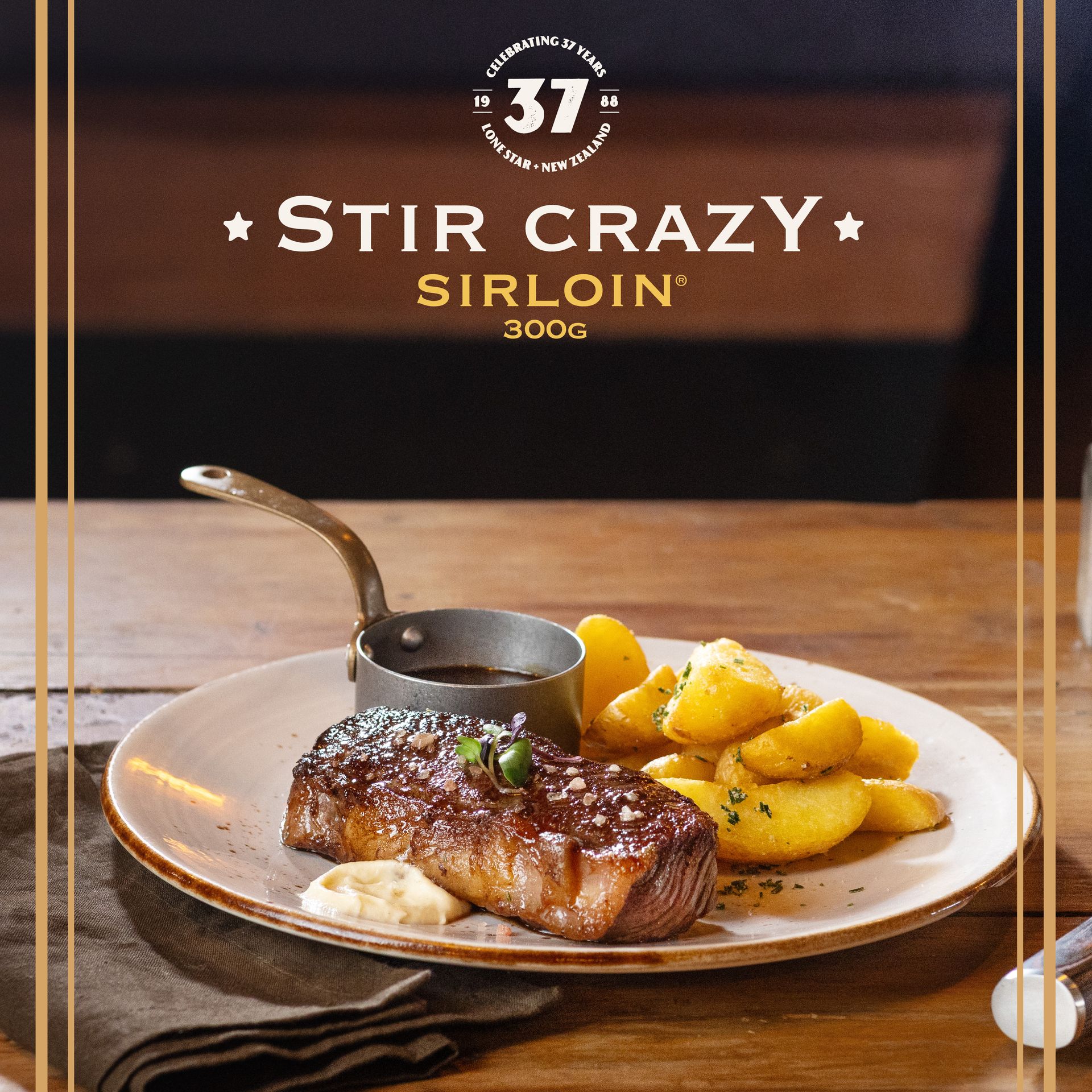 Plate of sirloin steak with sauce and potatoes on a wooden table, framed by a decorative border with text promoting a prize contest.