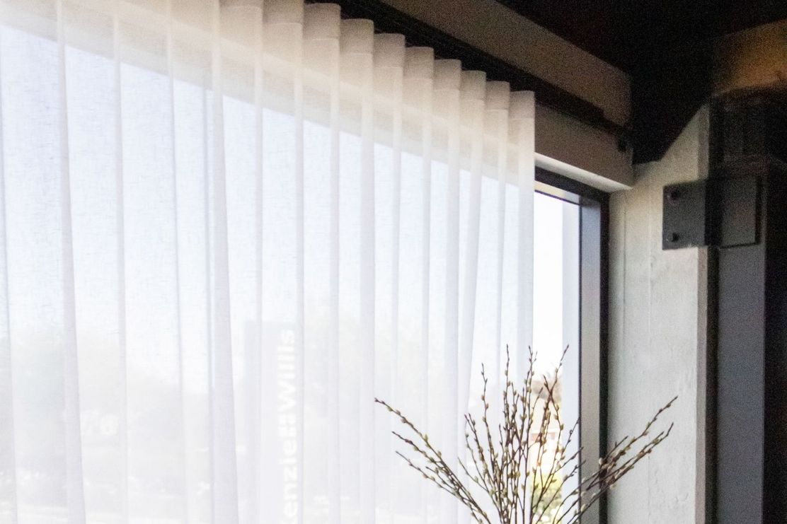 Spinnaker sheer curtains in an elegant off-white shade, offering a floaty and ethereal quality that brings lightness and softness to any interior.