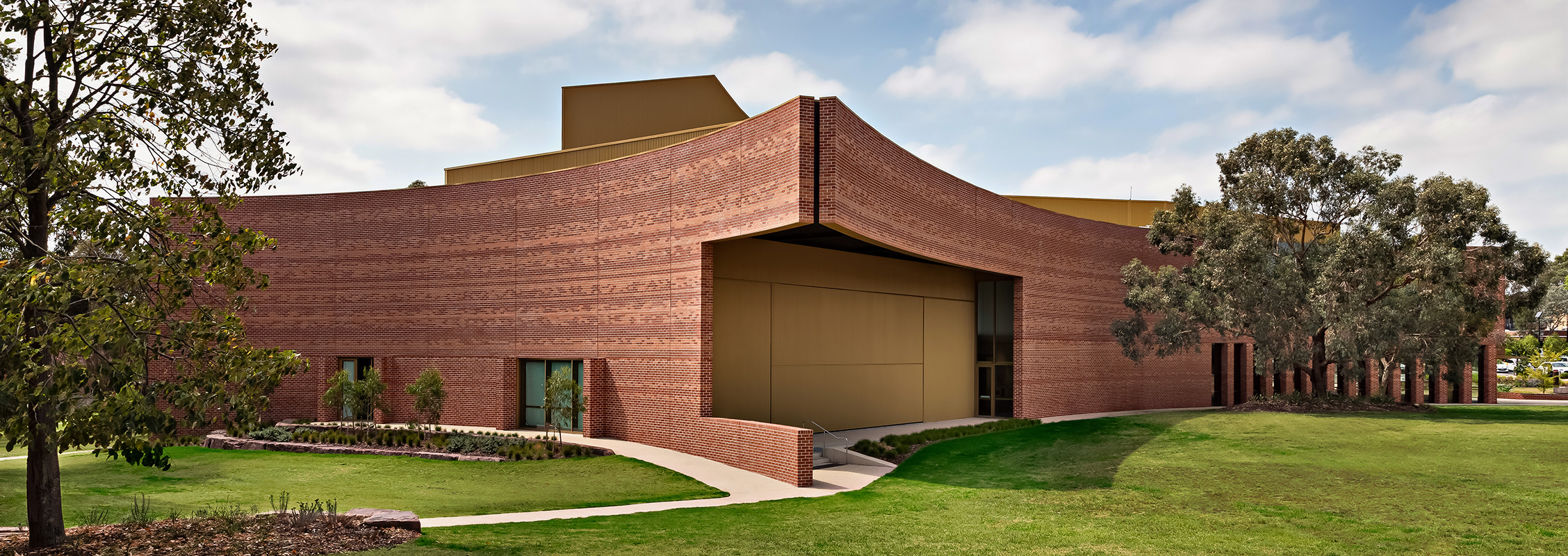 Lightweight, strong and versatile, light gauge steel (LGS) framing made from TRUECORE® steel is a key structural component that enables this striking, curved masonry facade to take shape.