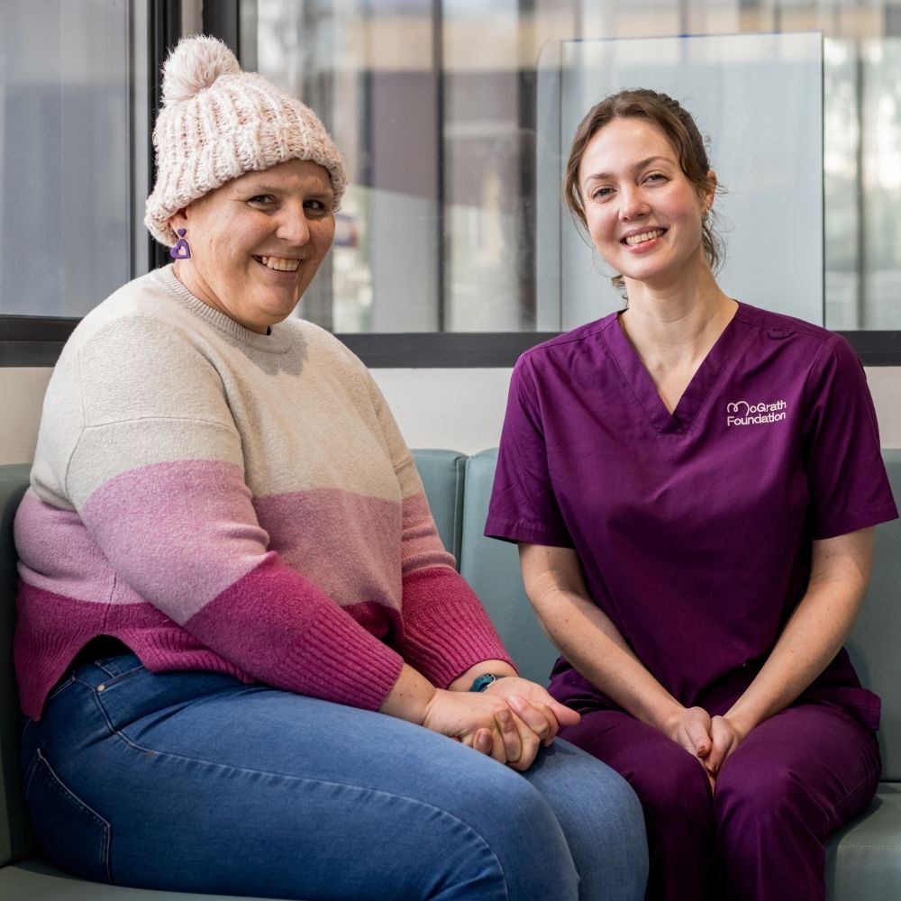 Rebecca seated alongside McGrath Cancer Care Nurse Carissa