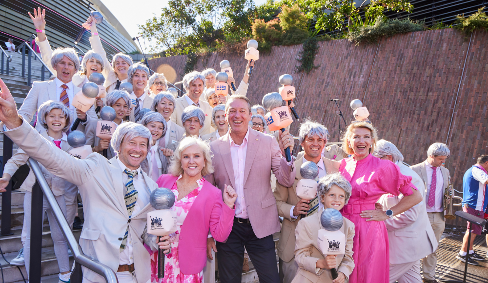 A group of The Richies standing with Glenn McGrath, Tracy Bevan and Holly Masters