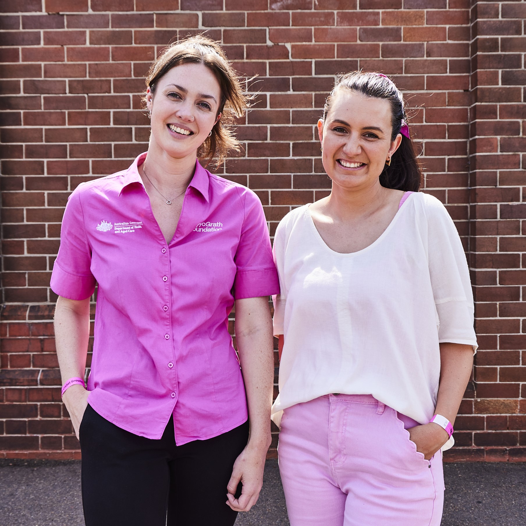Meg standing outside the Sydney Cricket Ground with her McGrath Cancer Care Nurse, Carissa