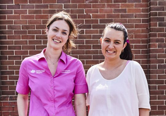 Meg standing outside the Sydney Cricket Ground with her McGrath Cancer Care Nurse, Carissa