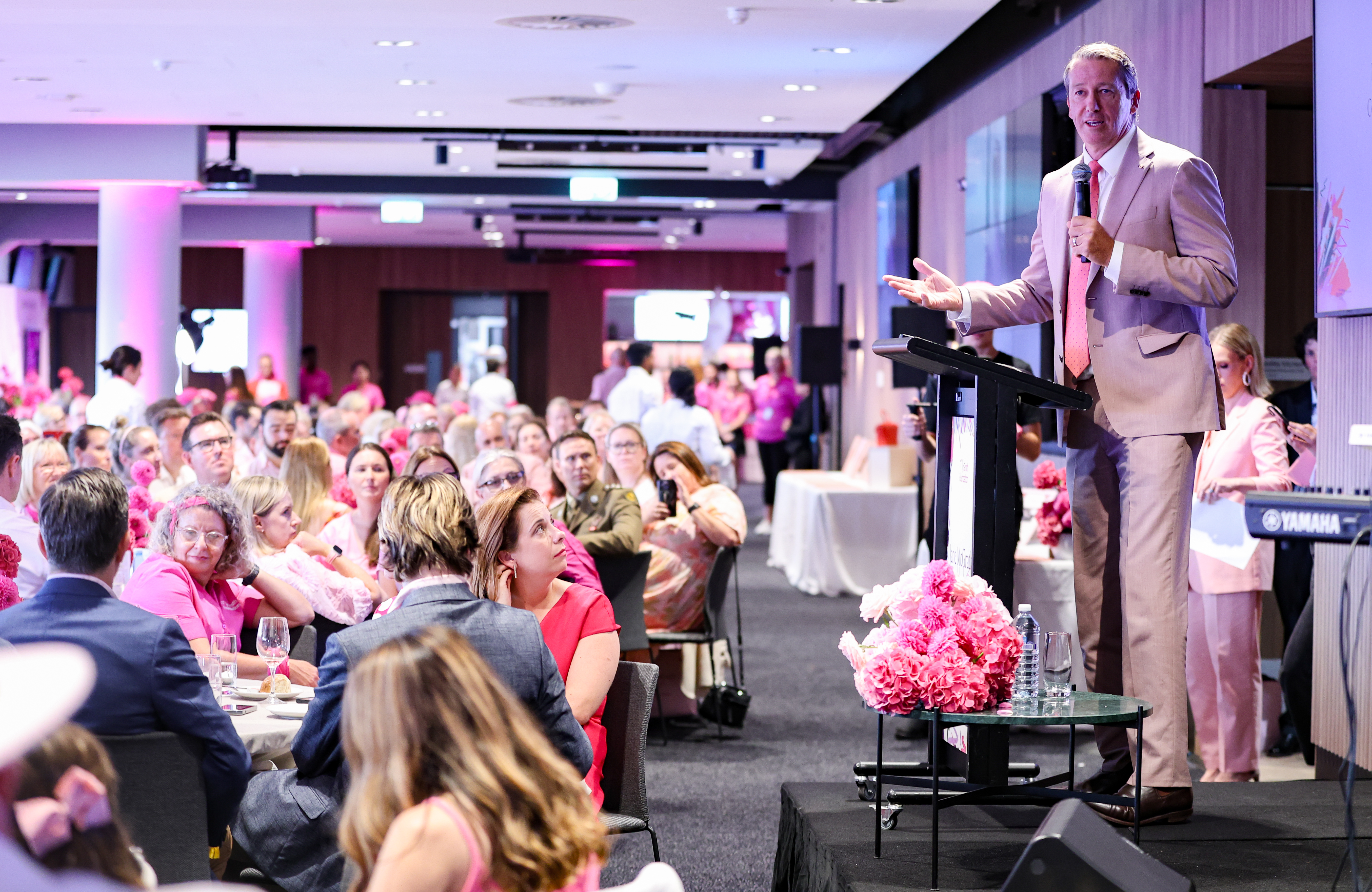 Glenn McGrath speaking at an event