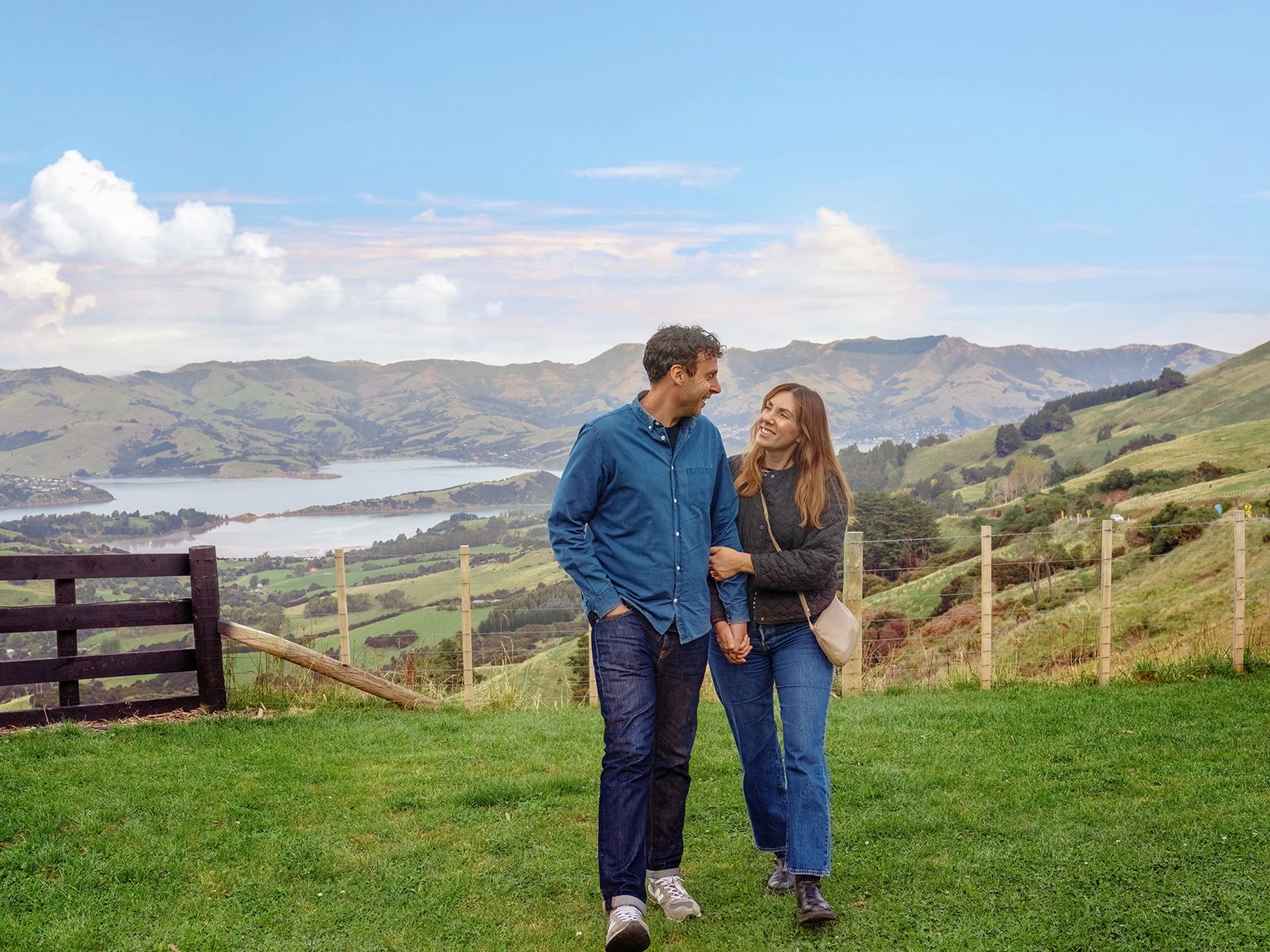 Sophisticated explorers enjoying Akaroa view