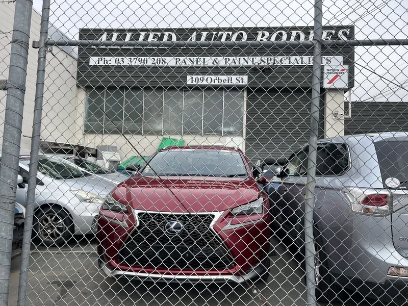 Red Lexus parked outside the Allied Auto Bodies panel and paint workshop