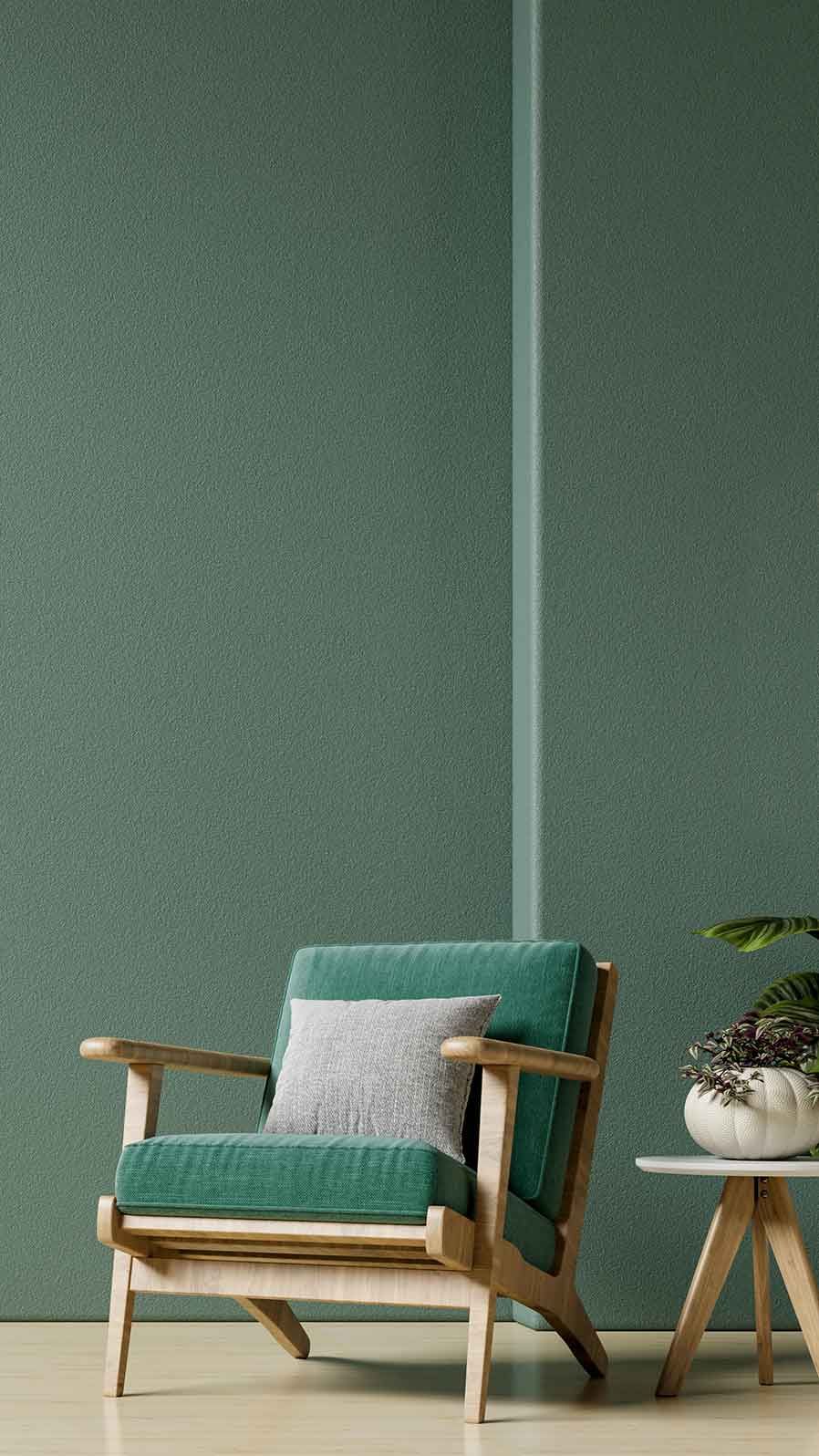Modern minimalistic room with green wall and wooden green arm chair.